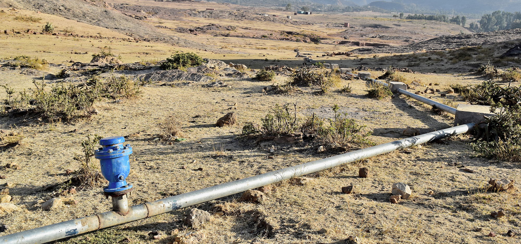 Wasserleitung in Afrika | © GettyImages/Neal Wilson Wasserleitung in Afrika